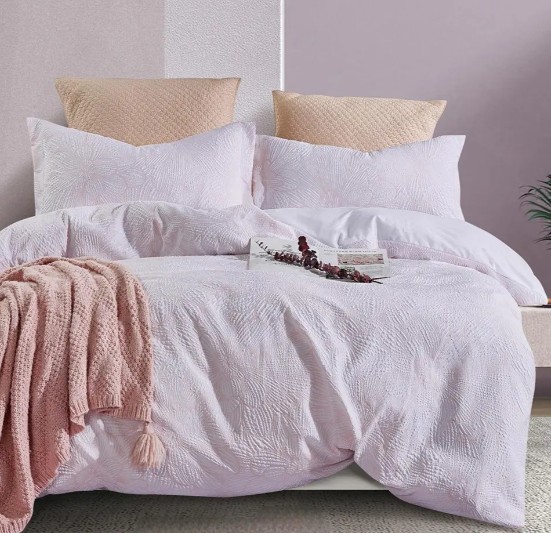 What makes the Zuma embossed floral bedding set different from regular duvet covers?